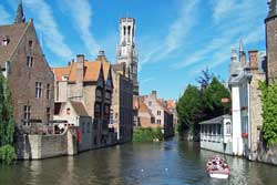 rozenhoedkaai view of belfort bruges belgium